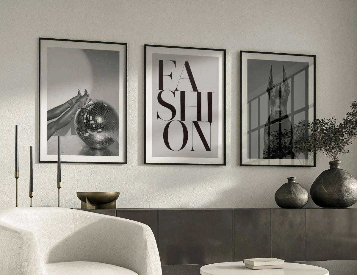 Black and white artwork highlighting a mouth with decorative grillz and shiny lips.