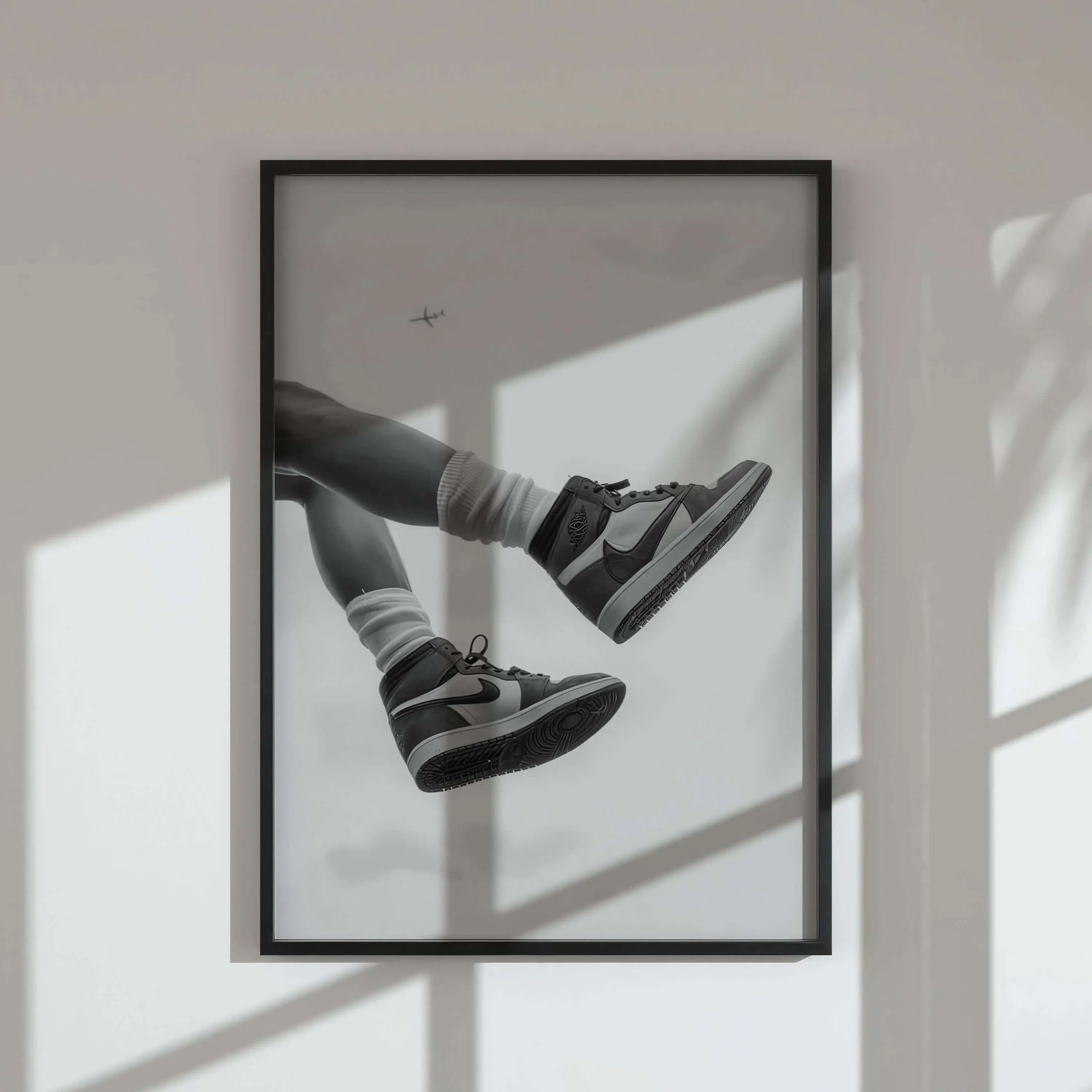 Close-up of sneaker interior, showing the padded collar and logo in a minimalist black and white design.