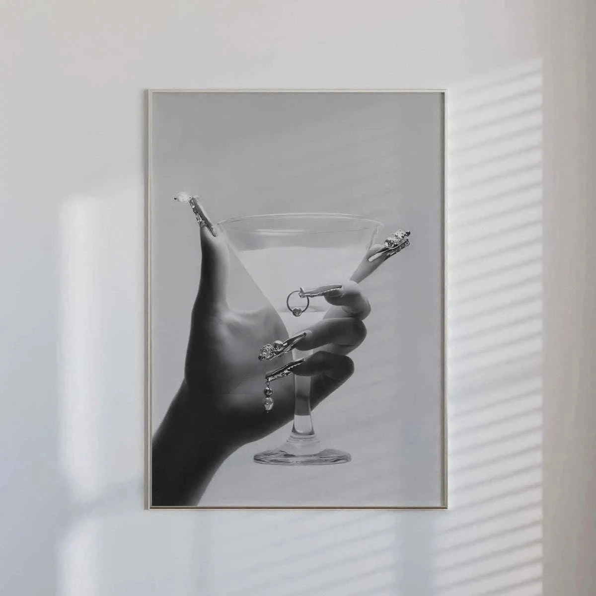 Print of stylish legs posed on a disco ball, creating a glamorous vibe for any room.