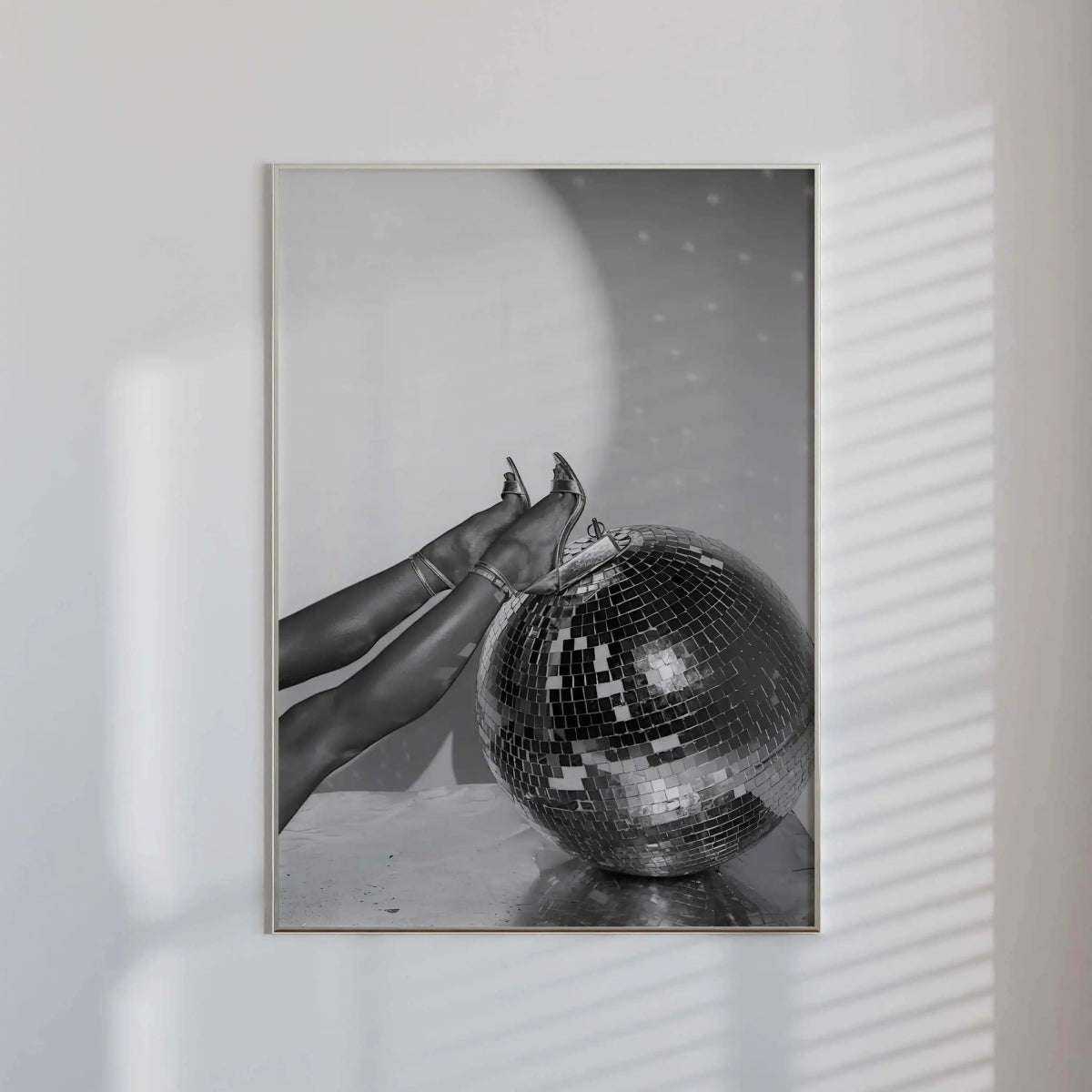 Close-up of a hand holding a woman's leg in high heels, a striking addition to fashionable wall art.