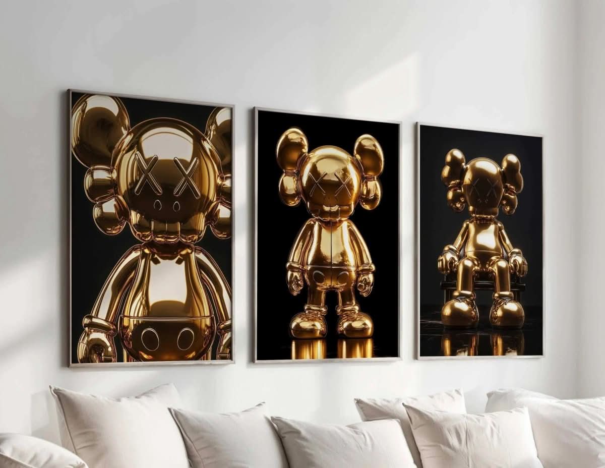Hypebeast Gold Posters Set of 3 showcasing three shiny KAWS figures in a chic decor setting.