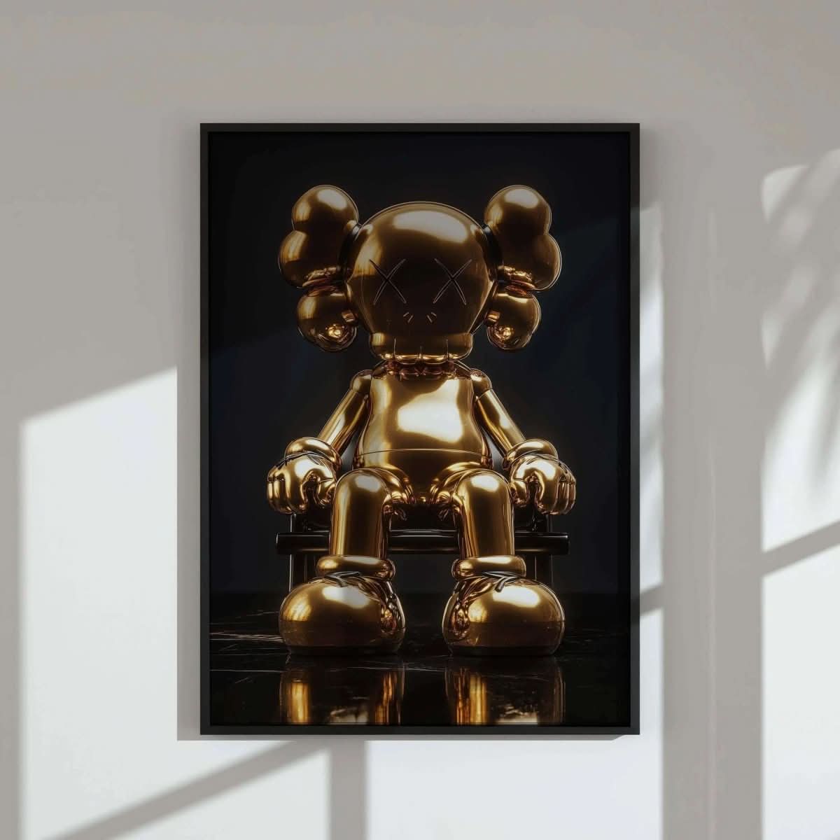 Side view of shiny KAWS poster from Hypebeast Gold Posters Set, featuring a seated figure against dark background.