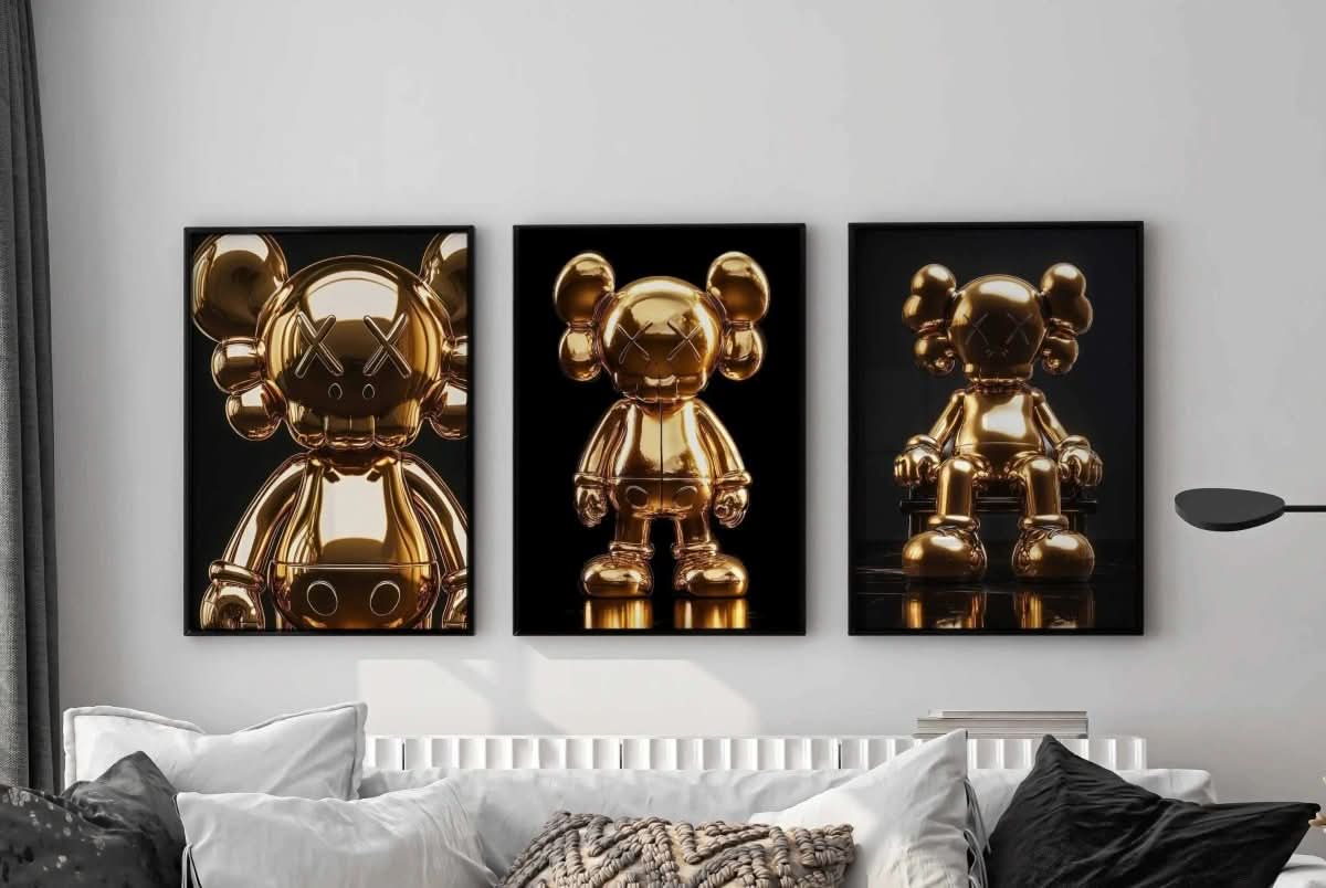 Hypebeast Gold Posters Set of 3 featuring KAWS art pieces elegantly framed on a modern wall.