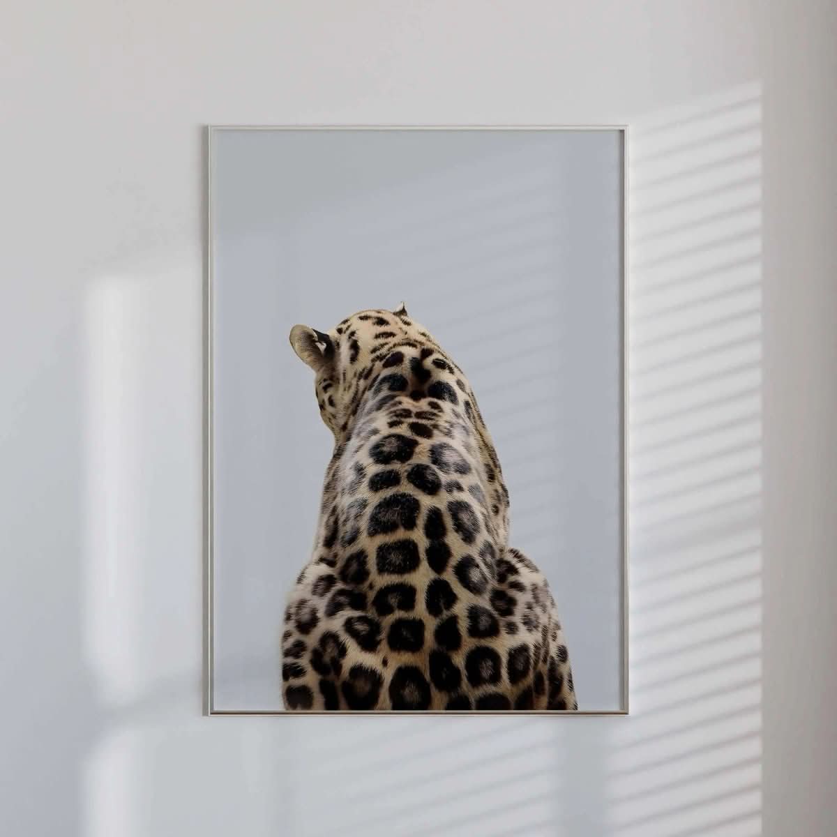 Leopard Design Wall Art Set of 3 showing a leopard back silhouette, a sophisticated piece for contemporary spaces.