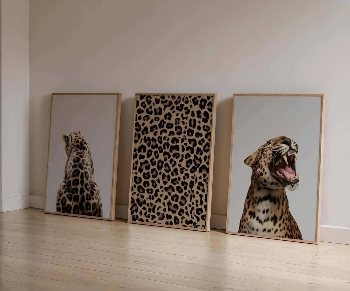Leopard Design Wall Art Set of 3 displaying a back view of a leopard alongside a leopard print background, stylish artwork for any room.