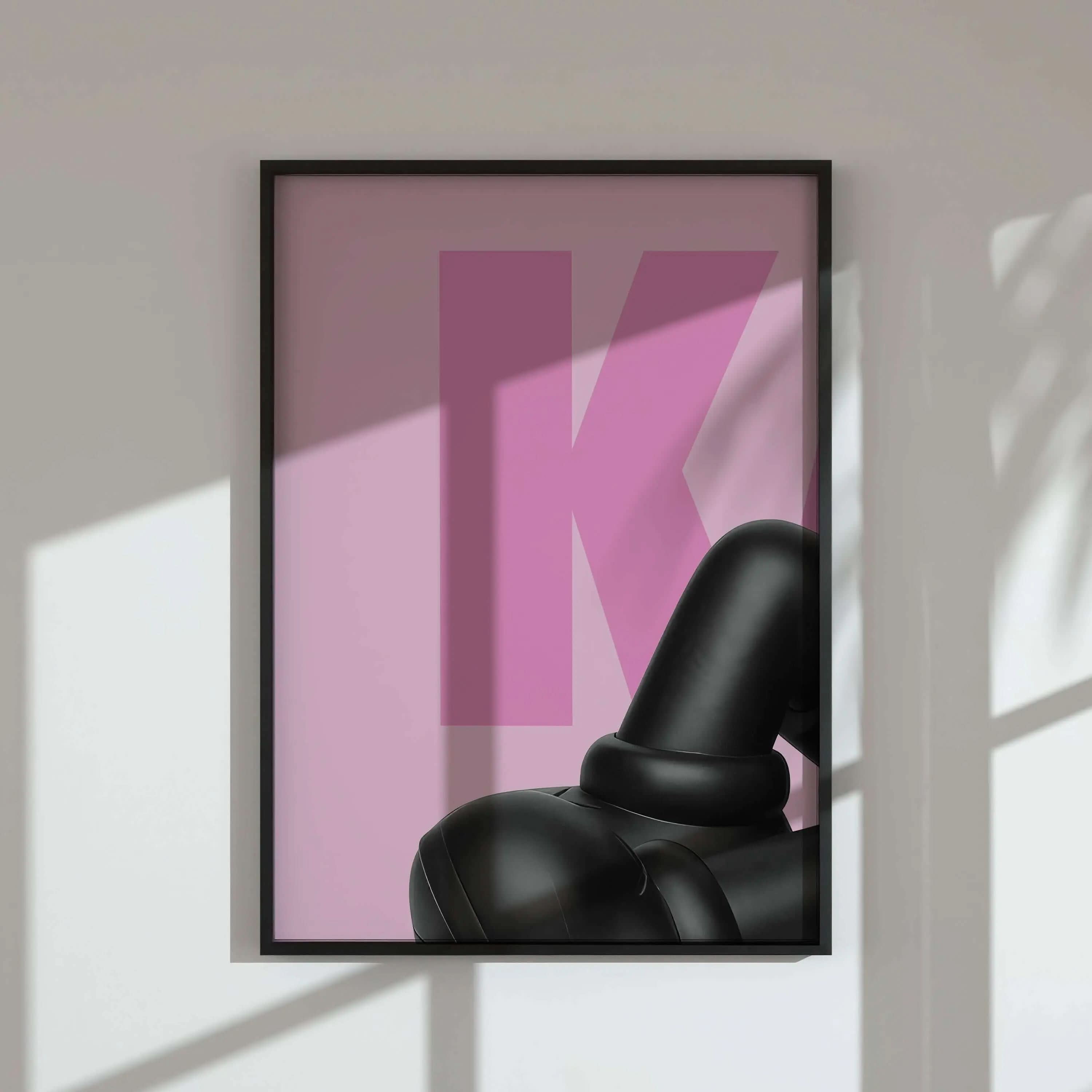 Close-up of KAWS black figure against pink, featuring playful abstract shapes and the letter "M".