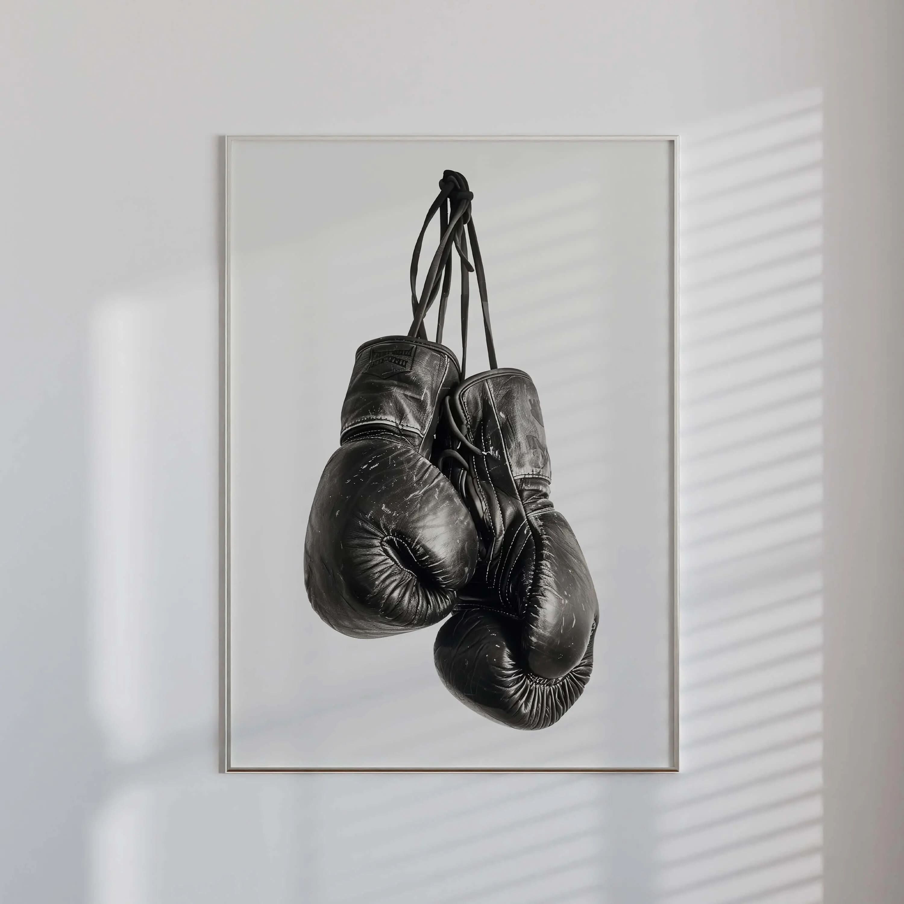 Vintage Boxing Gloves Wall Art showcasing gloves on a minimalist white background, perfect for modern aesthetics.