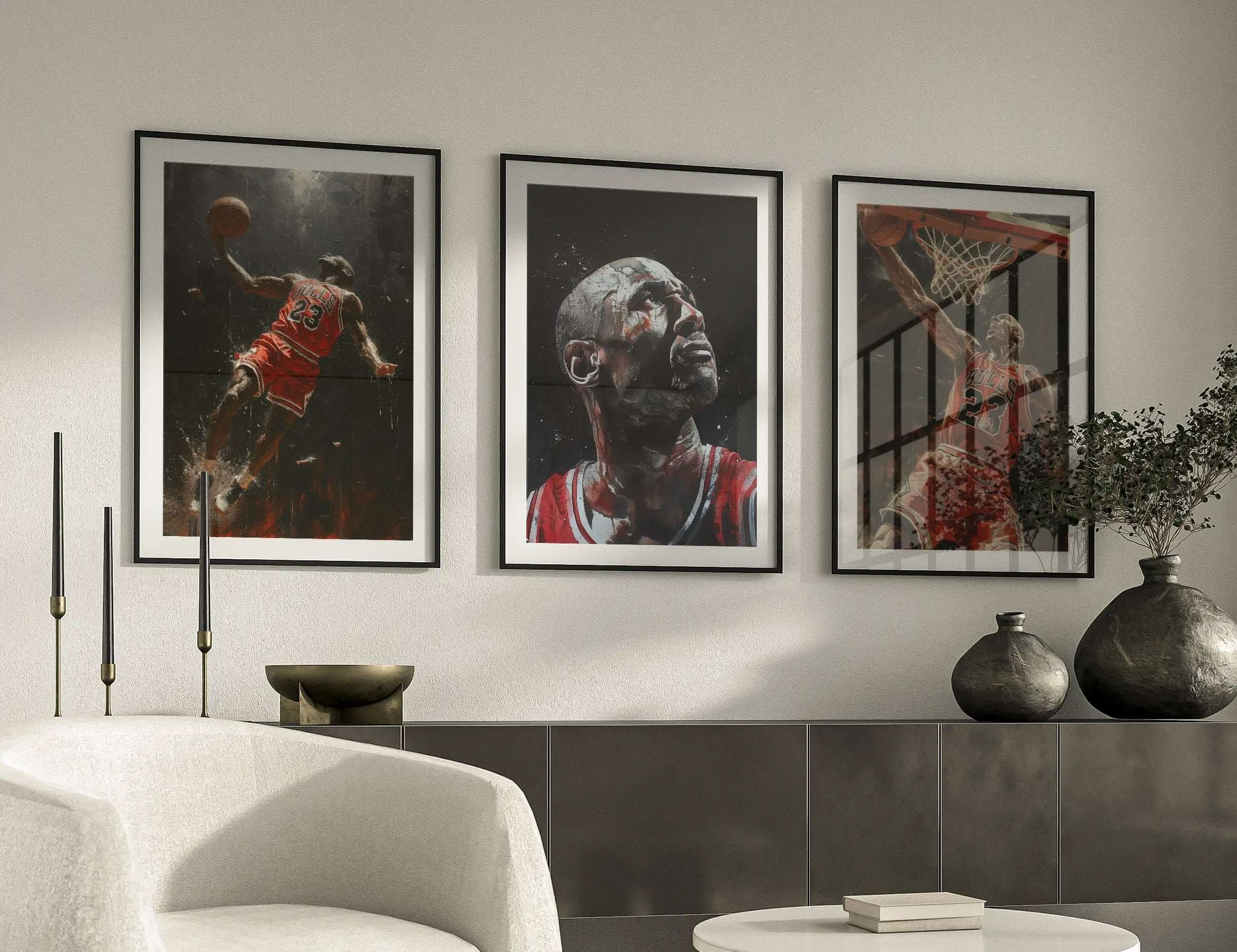 Three framed pictures of a basketball player on a wall above a coffee table.