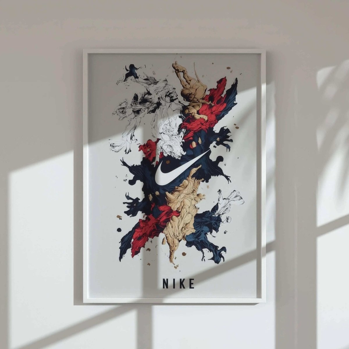 Abstract Nike sneaker art digital wall art print in bold red, blue, and tan splashes, framed on a white wall, modern decor by Haus of Prints.