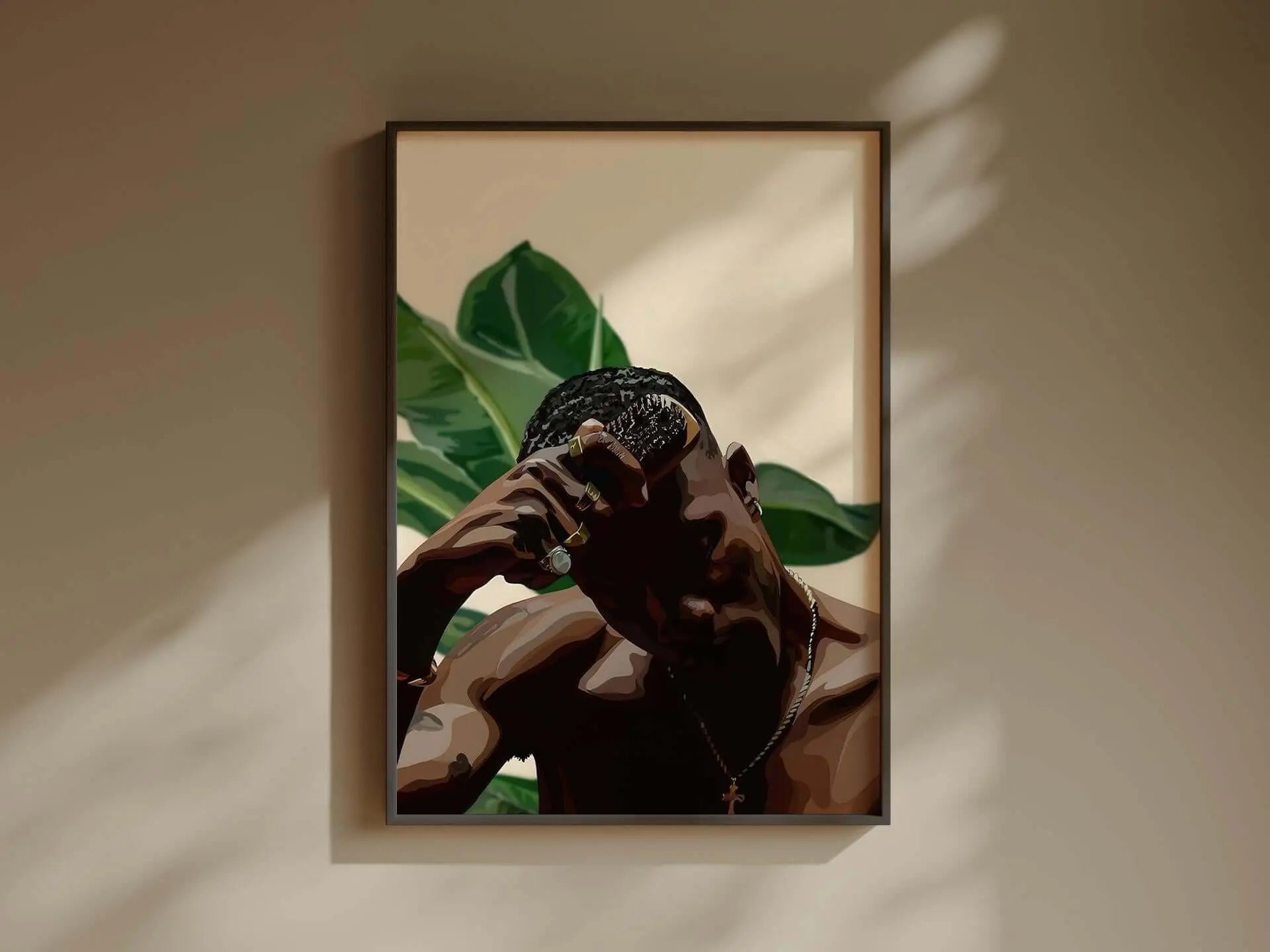 Black Melanin Art Set of 3 featuring Afrocentric digital wall art of a man with lush leaves, framed and styled in a modern living room — Haus of Prints.