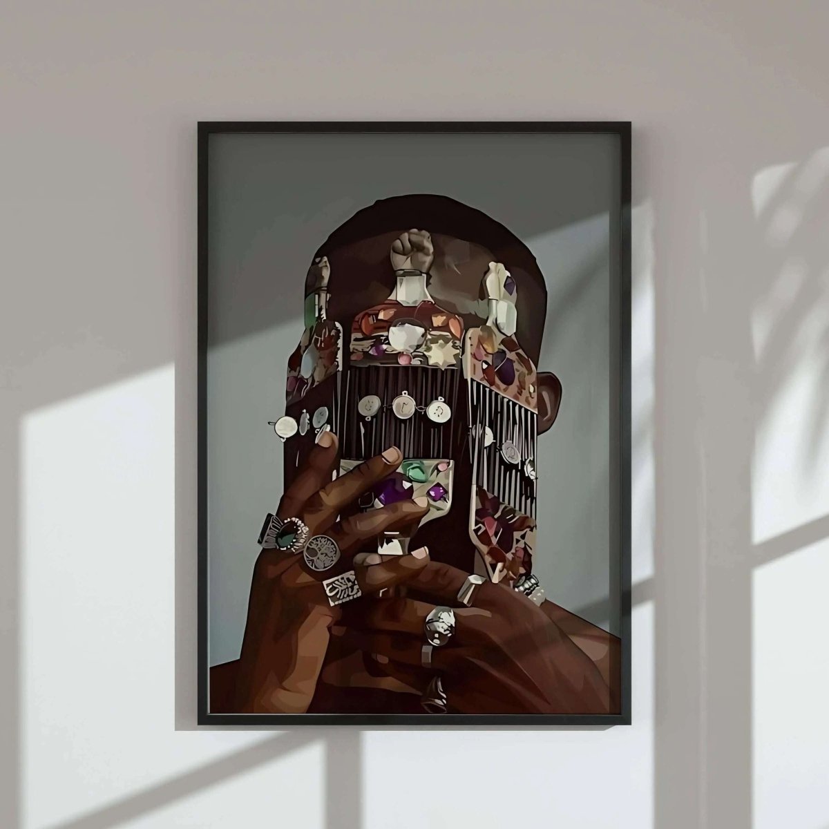 Framed digital wall art featuring Afrocentric design of a Black man holding ornate mask, modern home decor by Haus of Prints, Black Men Wall Art Set of 3.