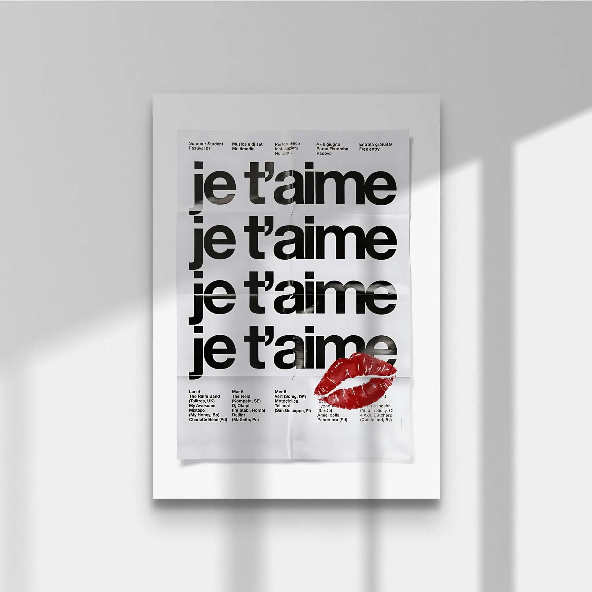 French Quote Poster Room Decor featuring "je t'aime" text in bold black typography with red lips print, modern digital wall art by Haus of Prints.