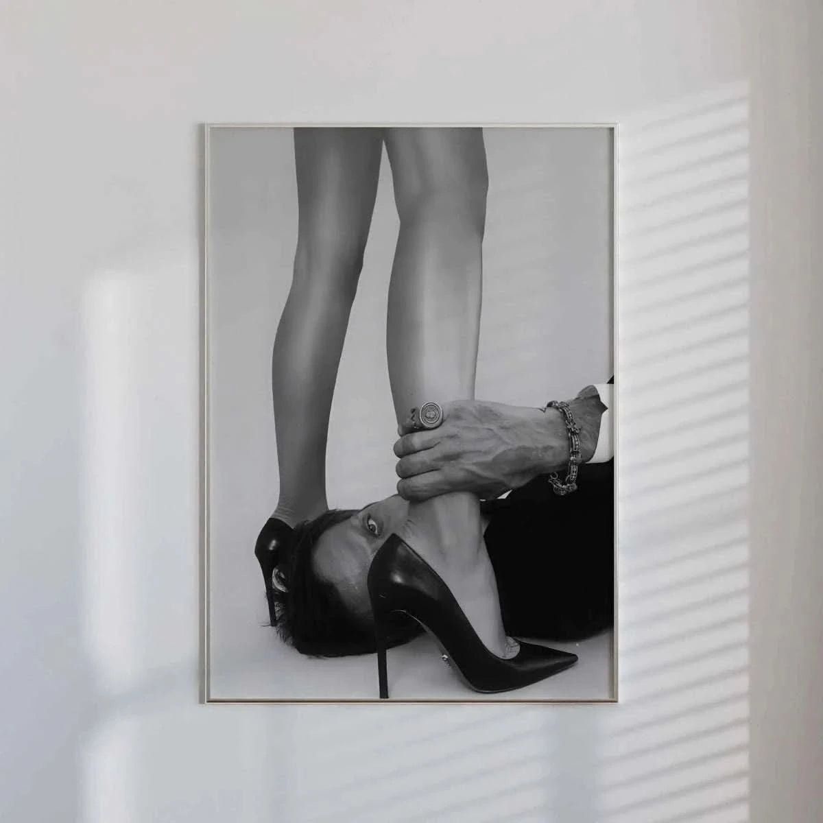 Set of 3 fashion prints in chic frames, featuring a martini glass, disco ball, and stylish legs.