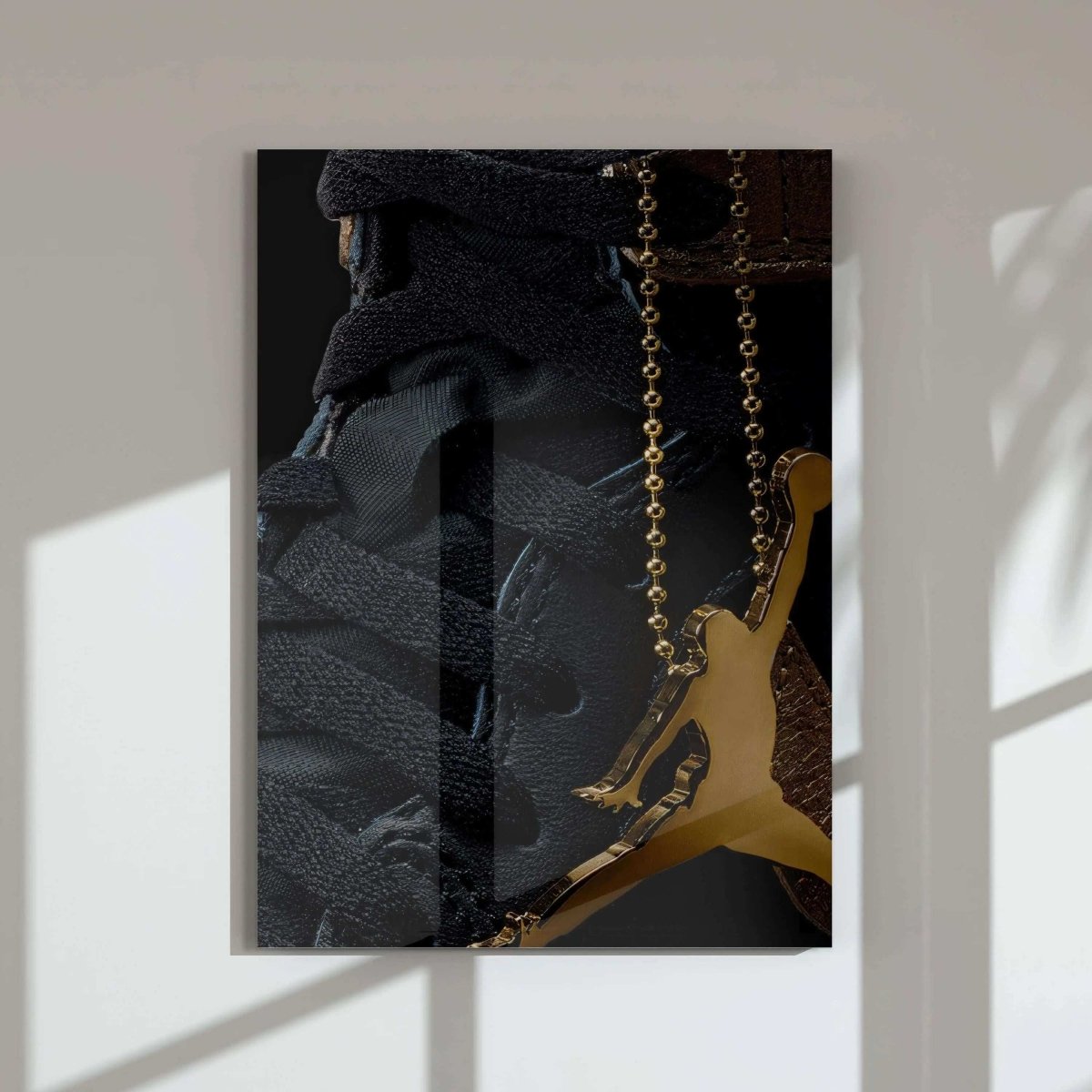 Hypebeast Nike Sneaker Wall Art featuring close-up sneaker laces and gold pendant, printable modern wall art for living room by Haus of Prints.