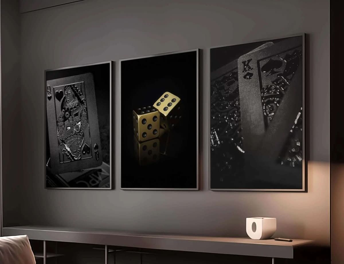 Golden dice placed artistically on a dark surface, capturing reflections in the Luxury Playing Card Wall Art Set.