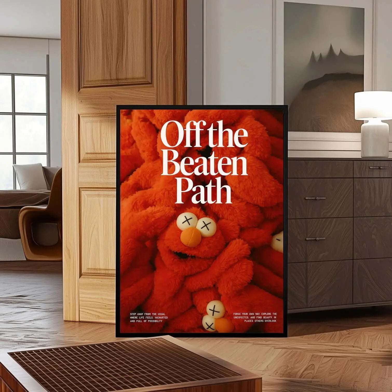 Off the Beaten Path KAWS-inspired plush digital wall art print in vibrant orange, framed and displayed in modern living room — Haus of Prints.