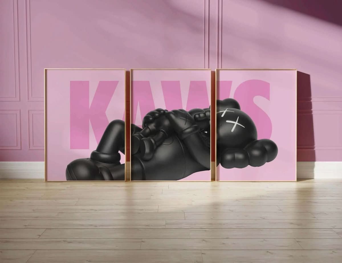 Vibrant KAWS artwork against a pink backdrop, showcasing the word "KAWS" in a bold fashion aesthetic.