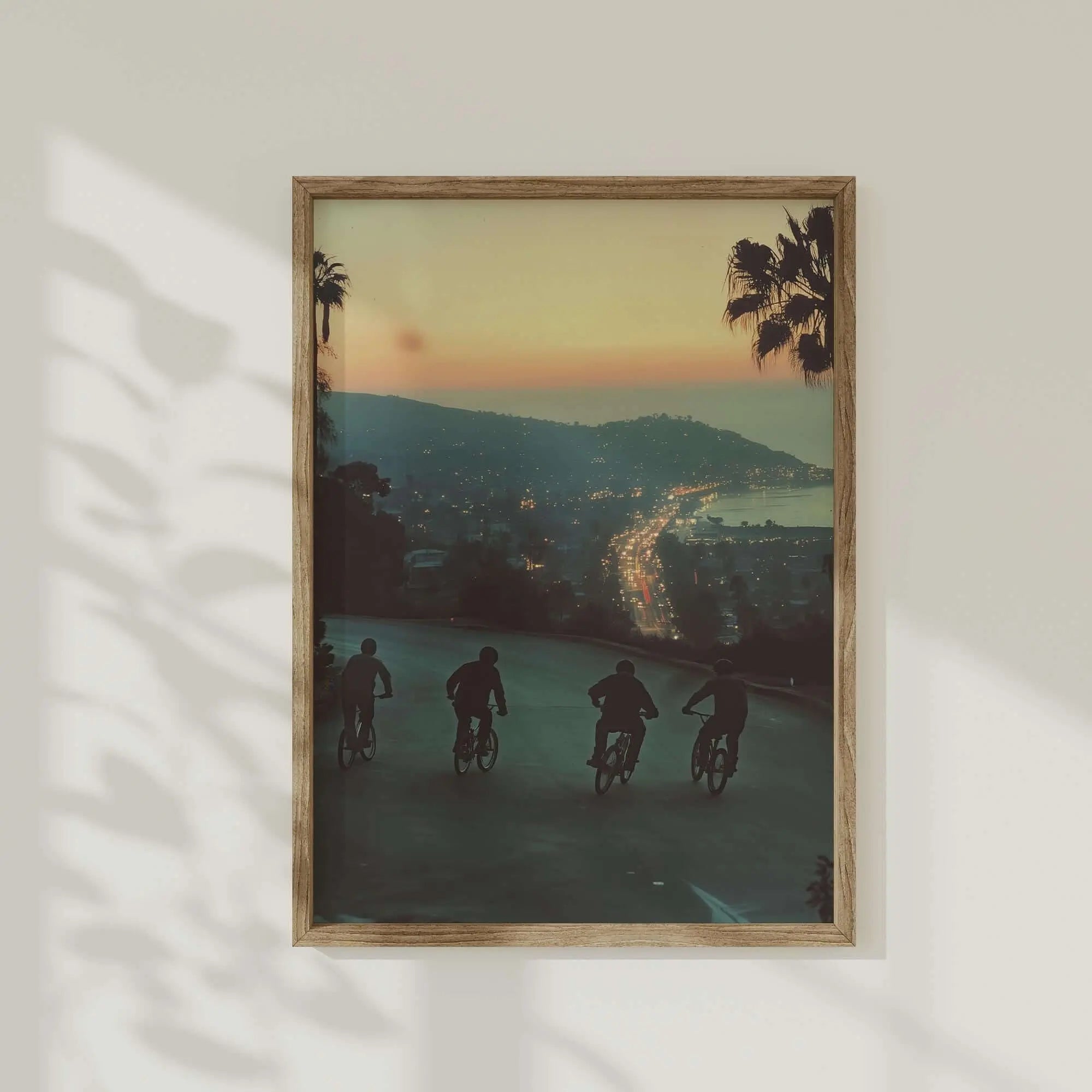 Vintage Cityscape Poster Set of 3 featuring dusk cityscape with cyclists, printable digital wall art for modern home decor, Haus of Prints.