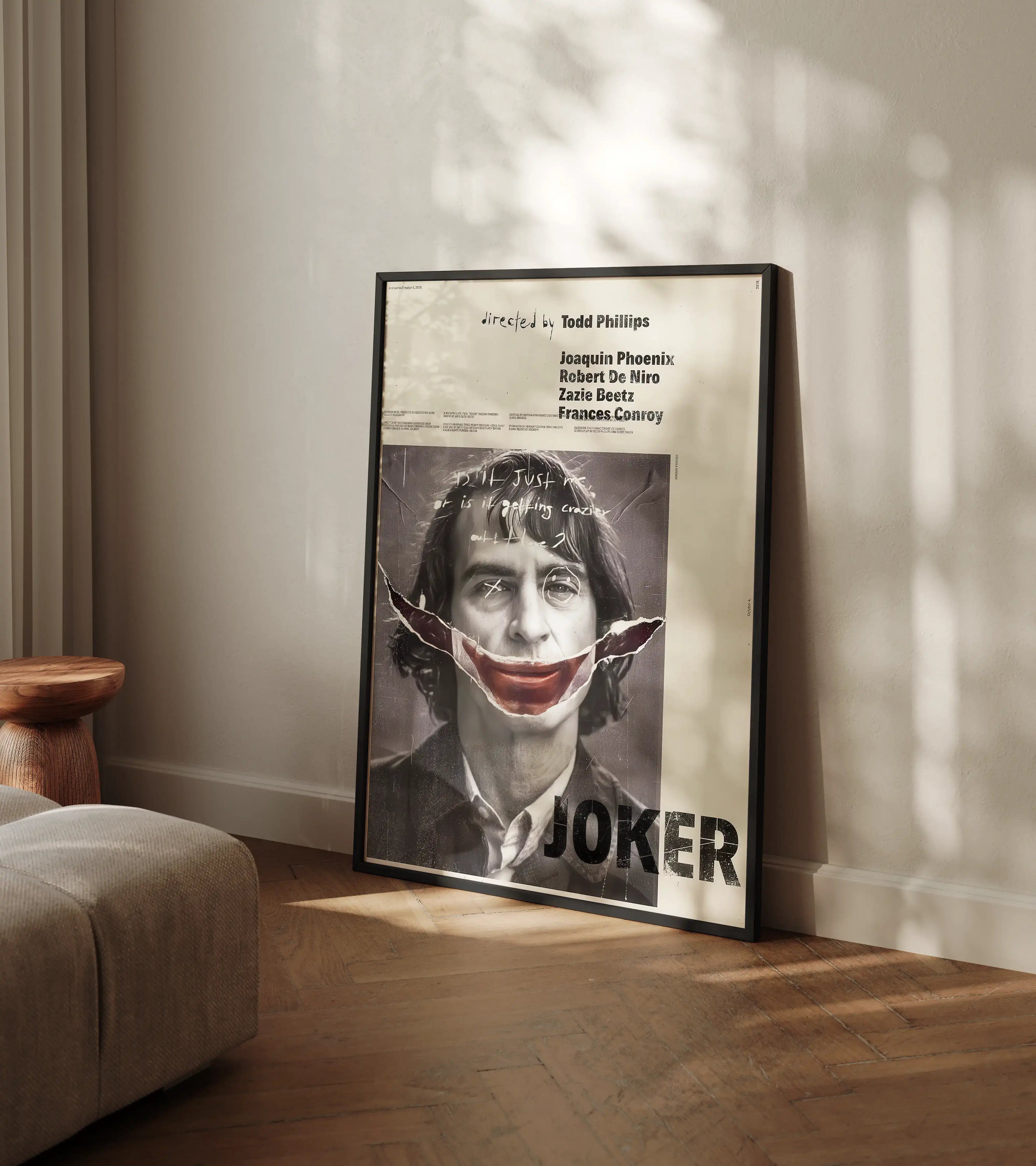 Vintage-style Joker movie poster of Joaquin Phoenix with distressed makeup and grunge aesthetics as digital print.