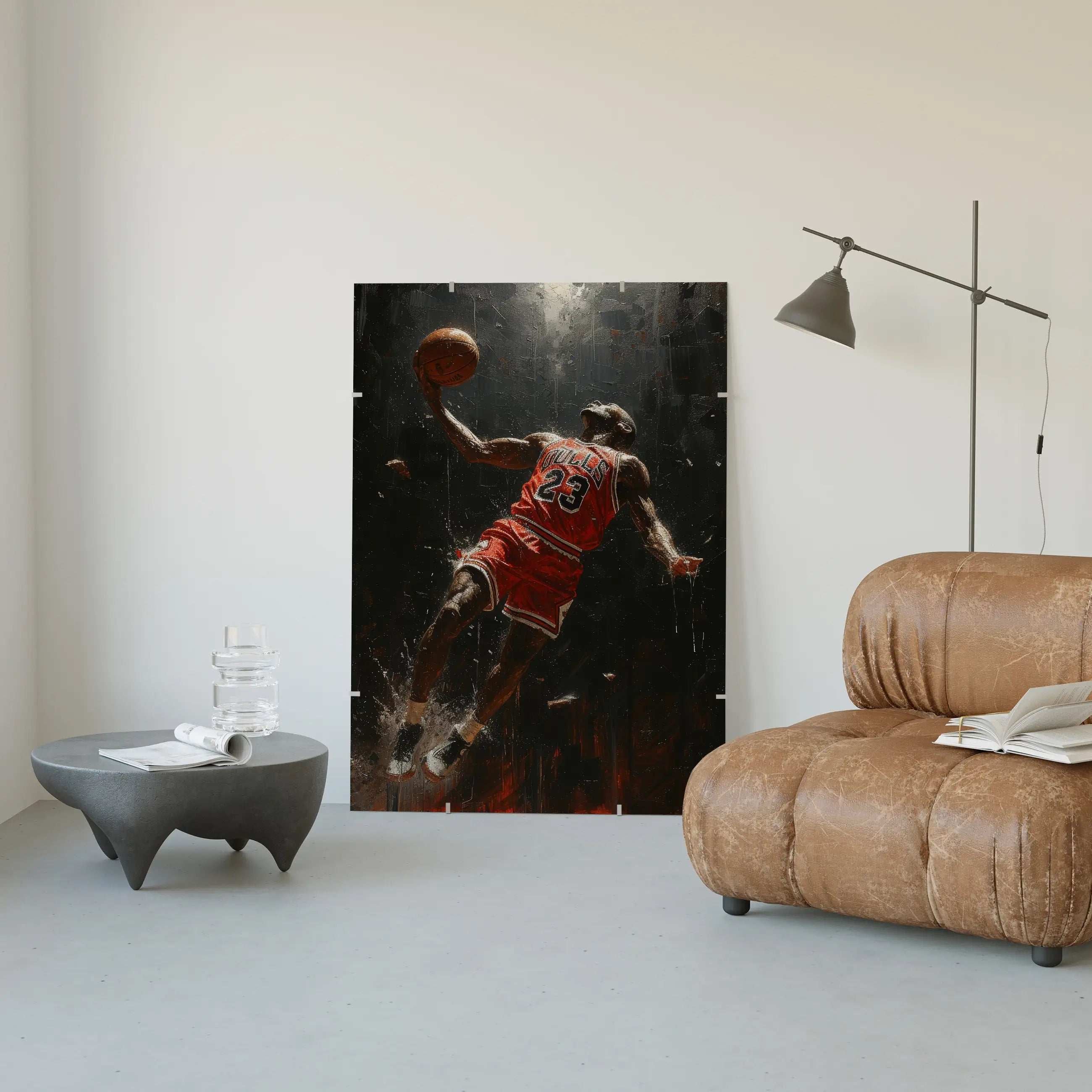 Living room with a large wall art of a basketball player in action, a brown leather chair, and a small table.