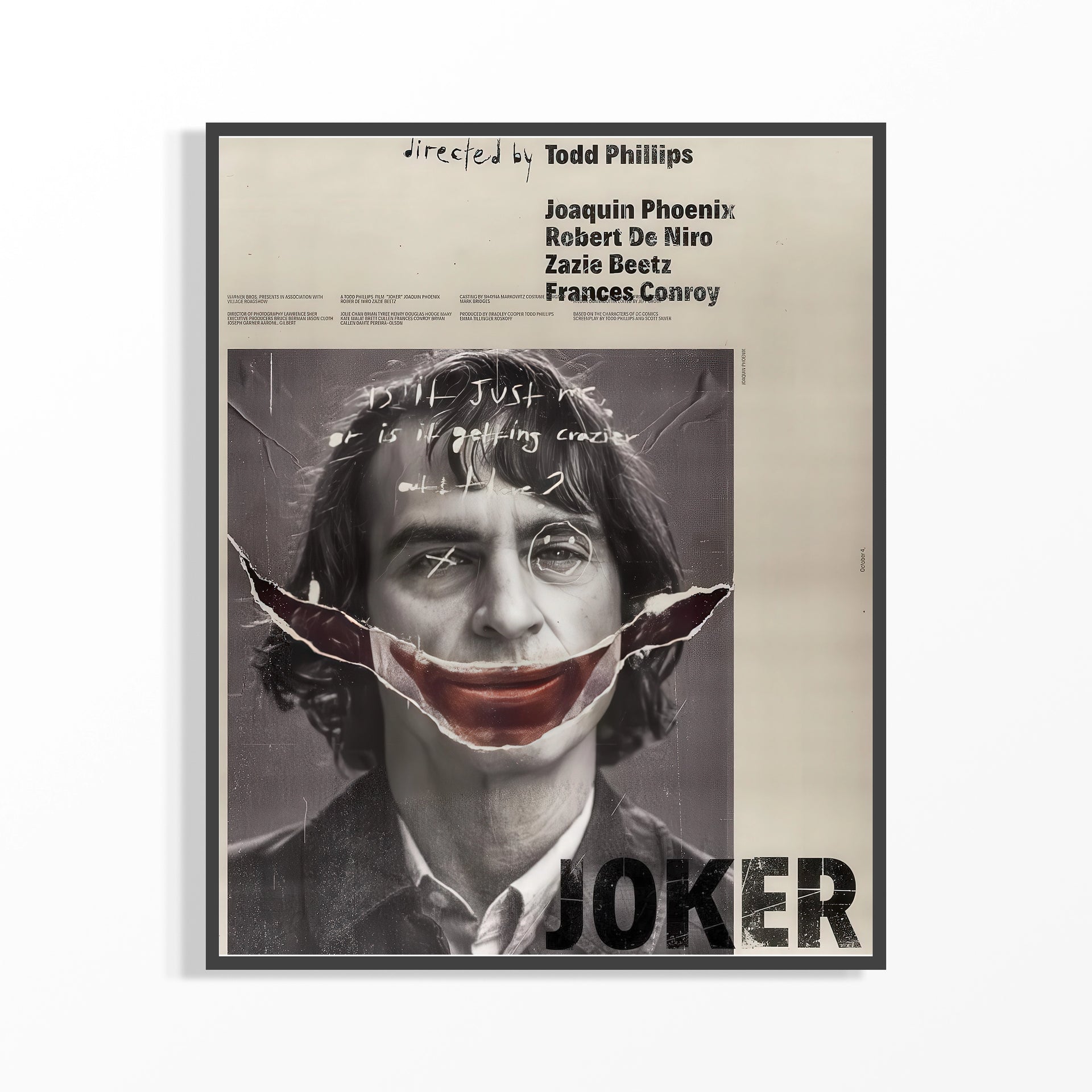 Joker Movie Poster featuring Joaquin Phoenix, showcasing a distressed design with red lips and dark makeup.